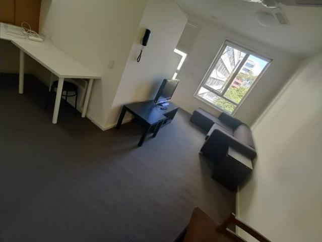 Stylish Furnished Apartment with Pool View – Walk to Uni & Lygon Street