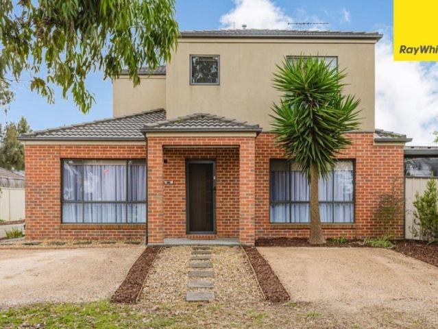 Stylish Family Townhouse with Multiple Living Areas, Solar Panels & Entertainer's Pergola