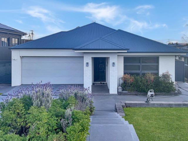 Stylish Family Home with Premium Inclusions in the Heart of Gillieston Heights