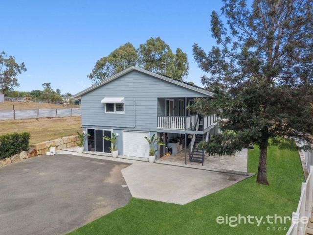 Stylish Family Living with Endless Possibilities + Shed on 2.2 Acres