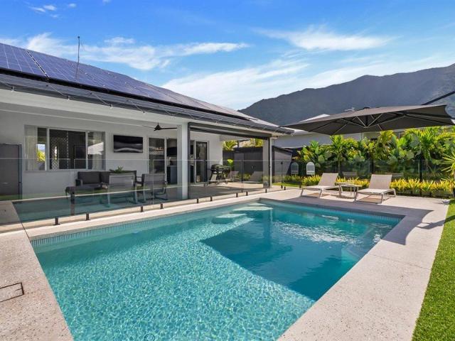 Stylish Family Living with Mountain Views, Stunning Pool & Exceptional Boat Access!