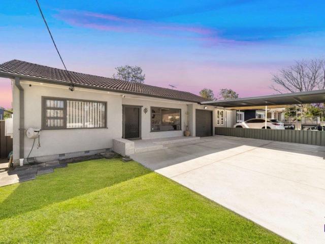 Stylish Family Residence in the heart of Georges Hall, close to daily amenities
