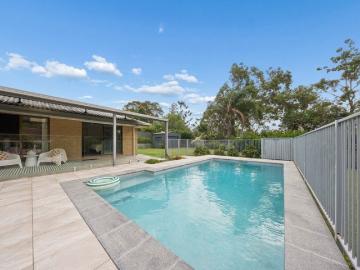 Stylish Family Sanctuary with Fabulous Poolside Living!