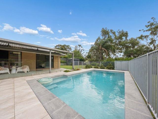 Stylish Family Sanctuary with Fabulous Poolside Living!