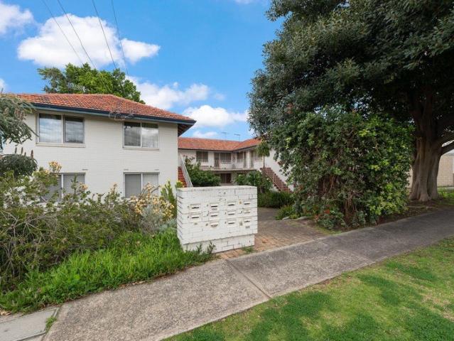 Stylish Ground Floor End Unit in Boutique Group of 10