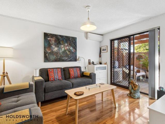 Stylish Ground Floor Living with a Private Courtyard and Garage