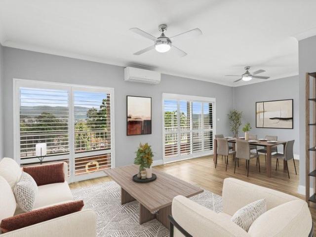 Stylish, Light Filled Living with Escarpment Views