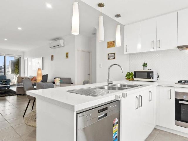 Stylish Living Just Moments from the Marina