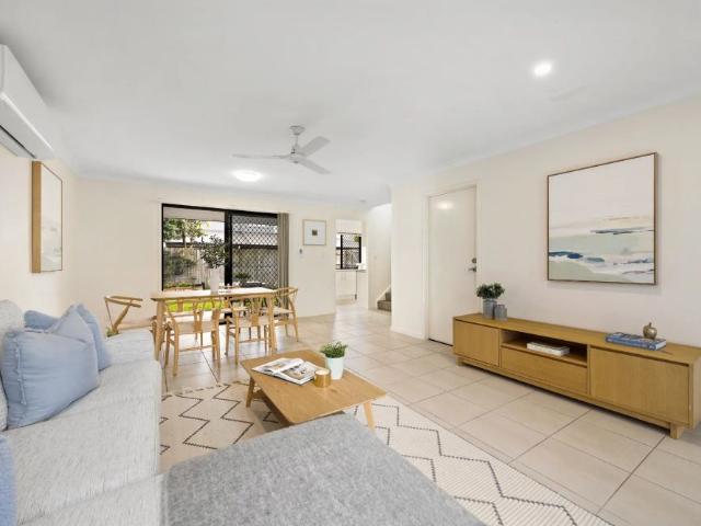 Stylish, low maintenance townhouse in peaceful complex