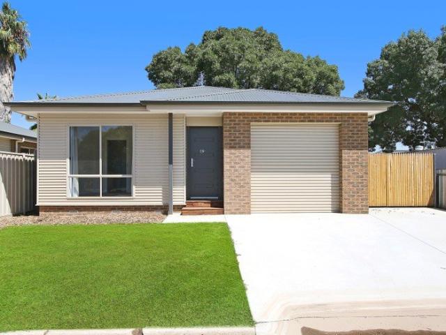 STYLISH LOW MAINTENANCE TOWNHOUSE ONLY A FEW YEARS OLD