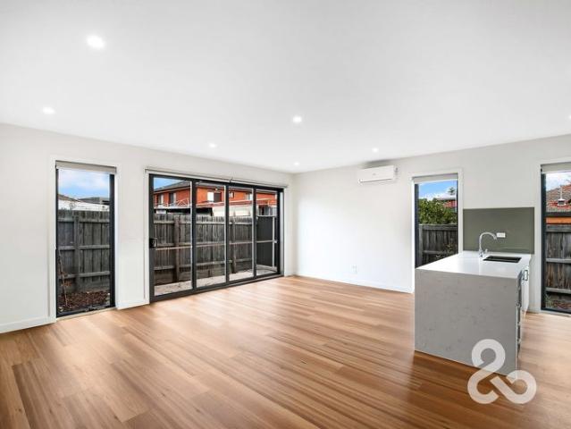 Stylish, Low Maintenance Living in a Contemporary Townhouse