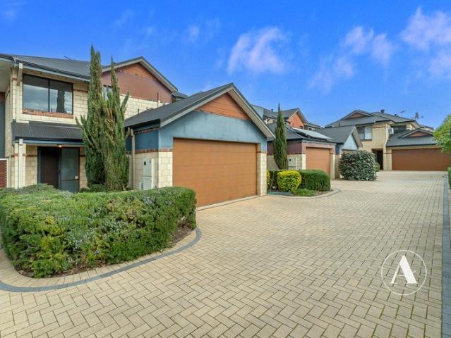 Stylish, Low Maintenance Living in a Convenient Location