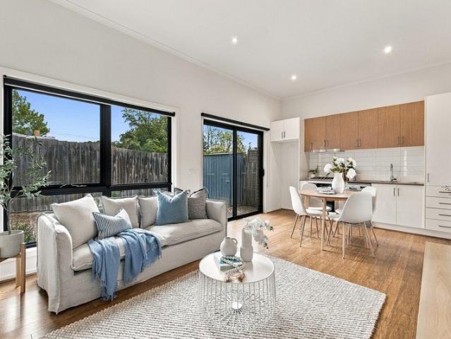 Stylish, Low Maintenance Living in a Convenient Reservoir Location
