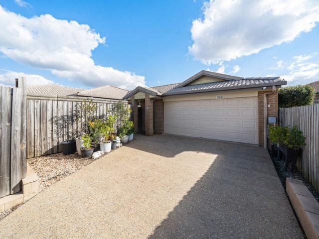 Stylish, Low Maintenance Living in a Private Position