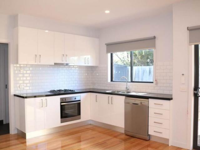 Stylish, Low Maintenance Living in a Prime Corner Location