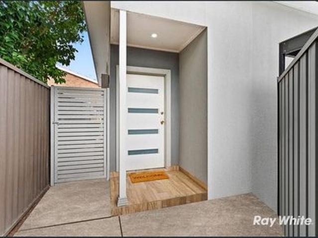 Stylish & Low Maintenance Living in a Prime Location