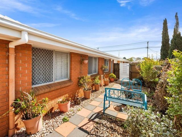 Stylish, Low Maintenance Living in a Quiet Triplex