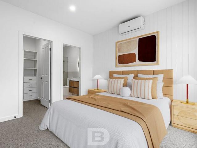 Stylish, Low Maintenance Living in a Quiet Woodend Setting