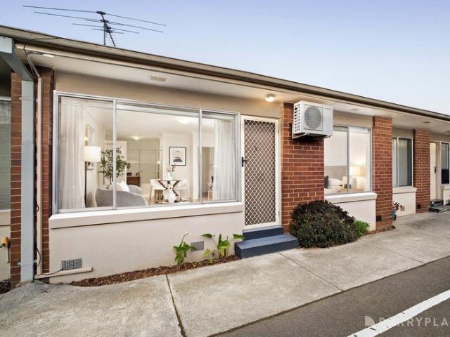Stylish Low Maintenance Living with Courtyard Appeal