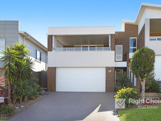 Stylish, Low Maintenance Living with House Sized Proportions & Escarpment Views