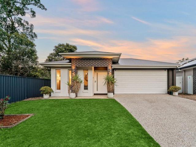 STYLISH LOWSET HOME OFFERING PRIVACY AND SPACE ON 401M2