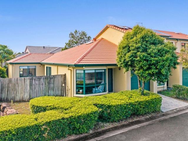 Stylish Lowset Living in a Resort Style Community