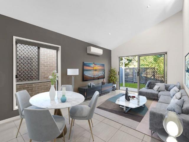 STYLISH PARKSIDE TOWNHOME IN SOUGHT AFTER ESSENCIA ESTATE