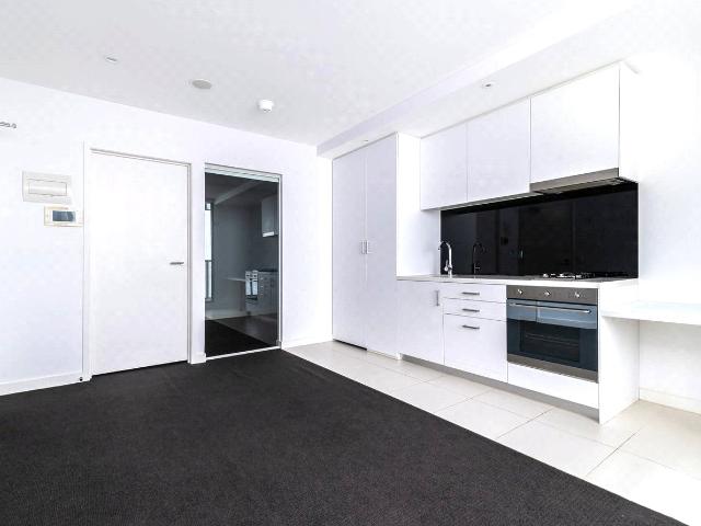 Stylish Partially Furnished Apartment in the Heart of Melbournes CBD