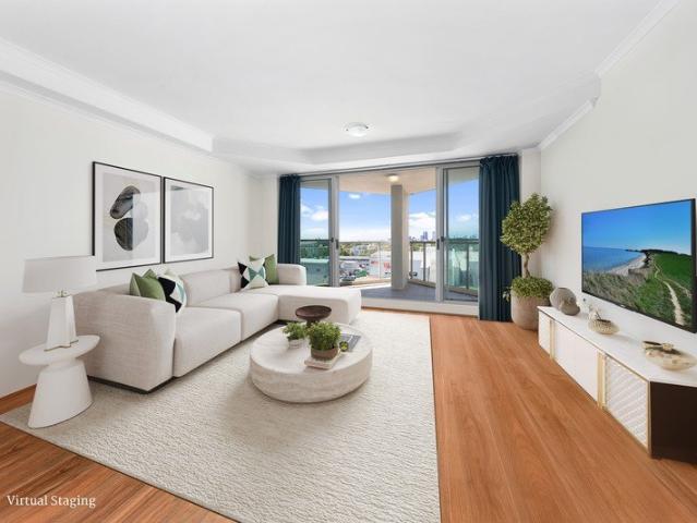 Stylish 'Regency' 2 Bed plus Study Apartment Enjoys City Skyline Views and Ultimate Convenience