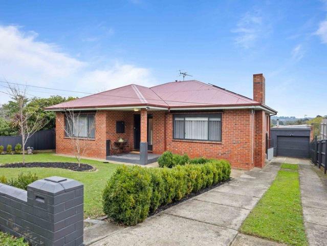 Stylish Renovated Home with Impressive Shed & Spacious Backyard