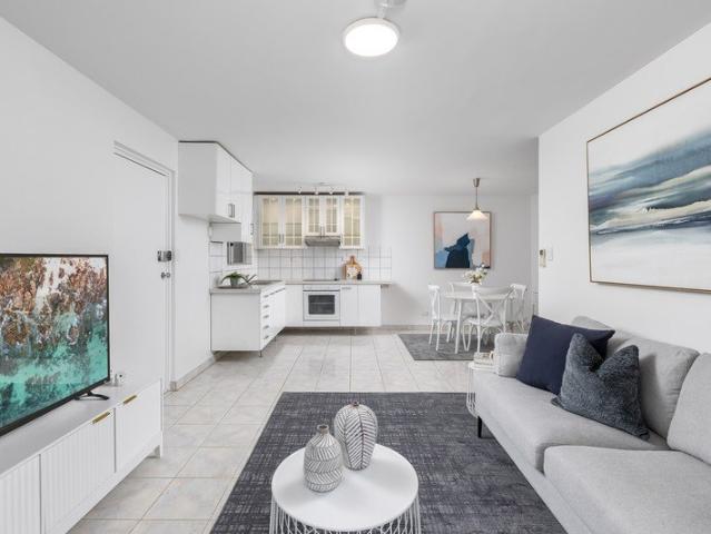 Stylish, Renovated Living in Exceptionally Convenient Location