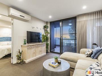 Stylish Riverside Apartment with Resort Amenities & Extra Balcony Space!