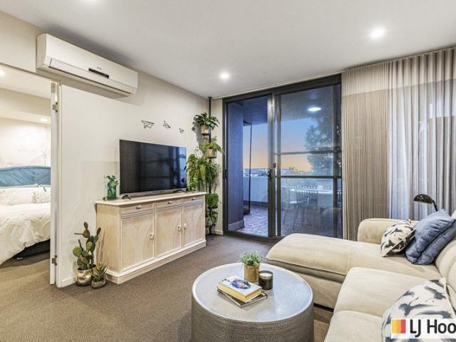 Stylish Riverside Apartment with Resort Amenities & Extra Balcony Space!