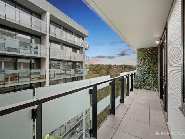 Stylish Riverside Living with Parkland Views