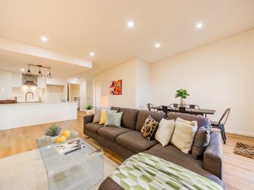 Stylish, Sun Filled Living with Tree Top Views and Unmatched Convenience