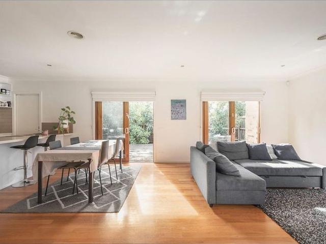 Stylish Single Level Townhouse in a Peaceful Boutique Setting