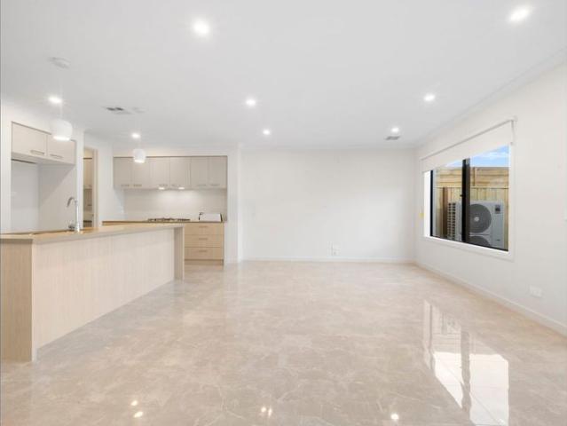 Stylish, Spacious & Brand New 4 Bedroom Townhouse!