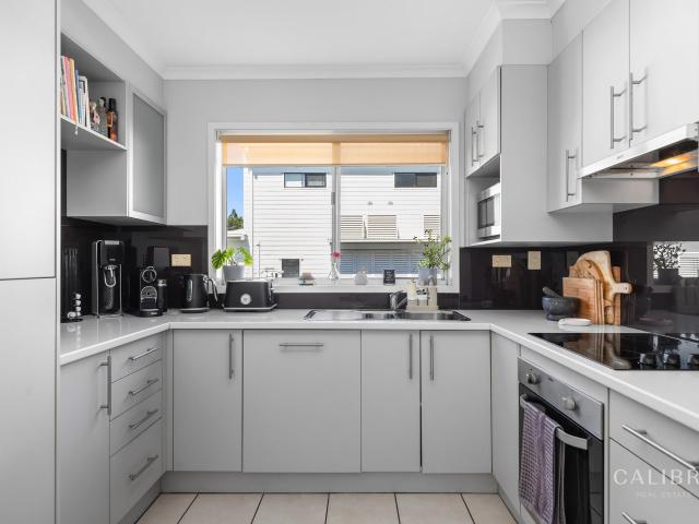 stylish & spacious two bedroom townhouse with courtyard in prime location!