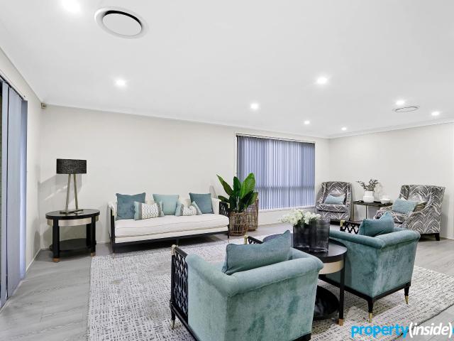 Stylish split level residence: house to let in 24 Wellgate Avenue, NORTH KELLYVILLE NSW 2155 4 bed