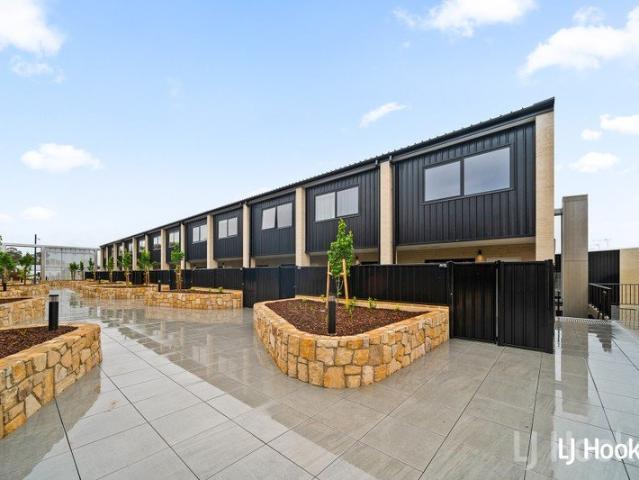 Stylish Split Level 2 Bedroom Home with Triple Garage