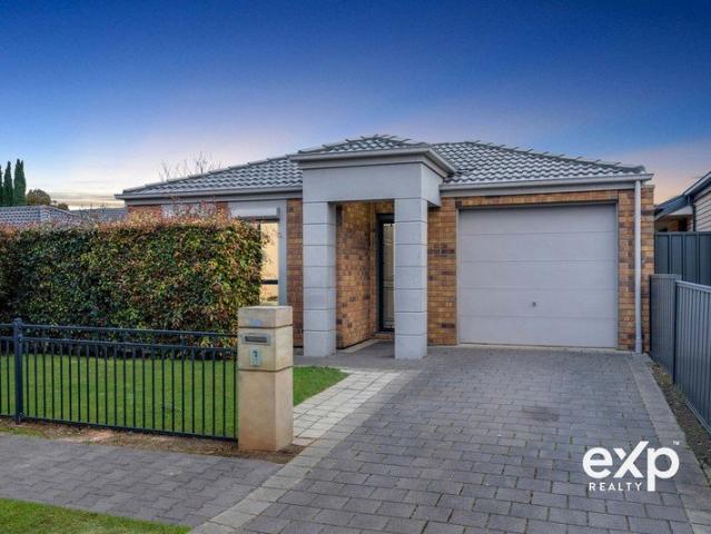 Stylish, Turnkey Living in a Fast Growing Location