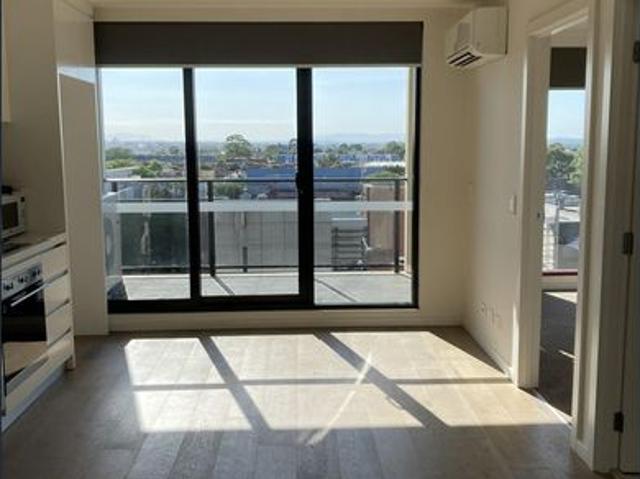 Stylish Two Bedroom Apartment with Balcony, Secure Parking & Prime Melbourne Location