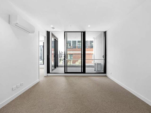 Stylish Two Bedroom Apartment with Sunny Balcony, Secure Parking