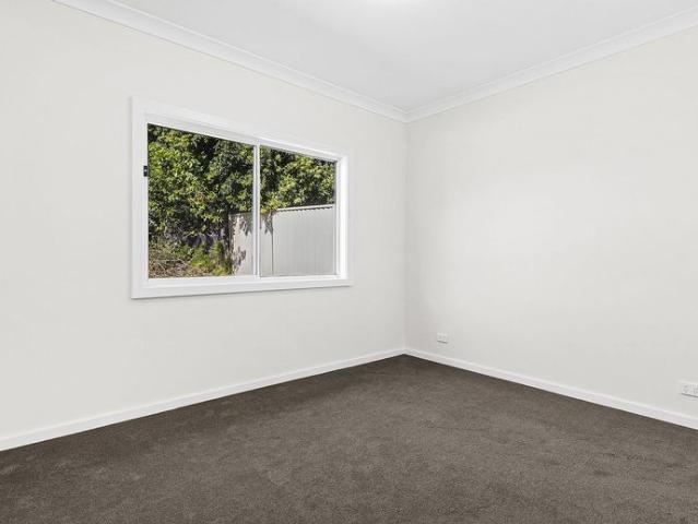 Stylish Two Bedroom Home with spacious Deck & Modern Comfort