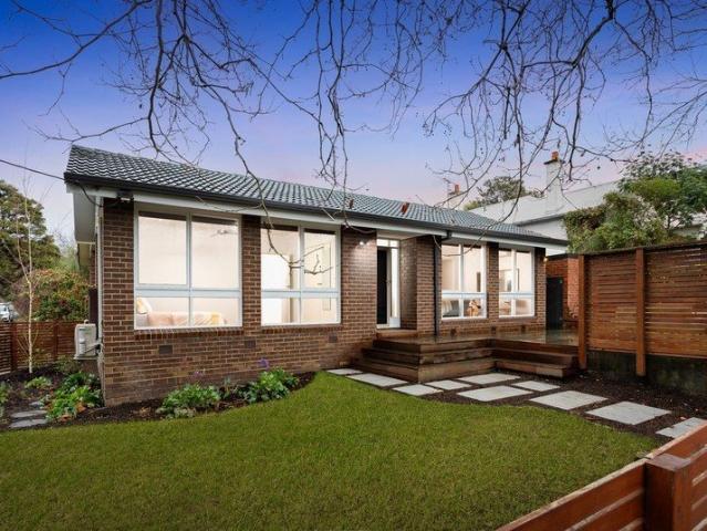 Stylish Two Bedroom Home with Spacious Deck and Prime Location