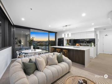 Stylish Two Bedroom Retreat with Pool Views in Coorparoo Square