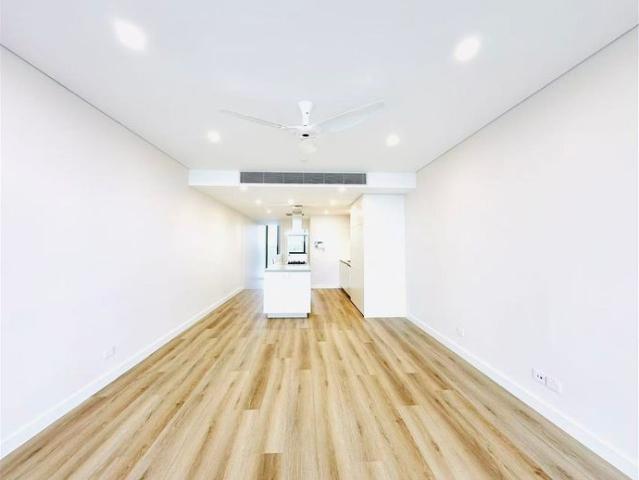 Stylish Two Bedroom Two Level Apartment with Water Views, Study, Parking & Storage
