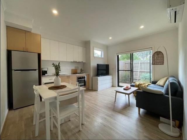 Stylish Two Bedroom Townhouse in a Prime Location!