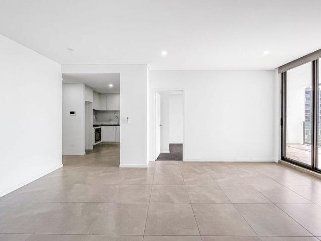Stylish Two Bedroom Unit with Modern Kitchen, Ensuite, and Oversized Balcony in Prime Location