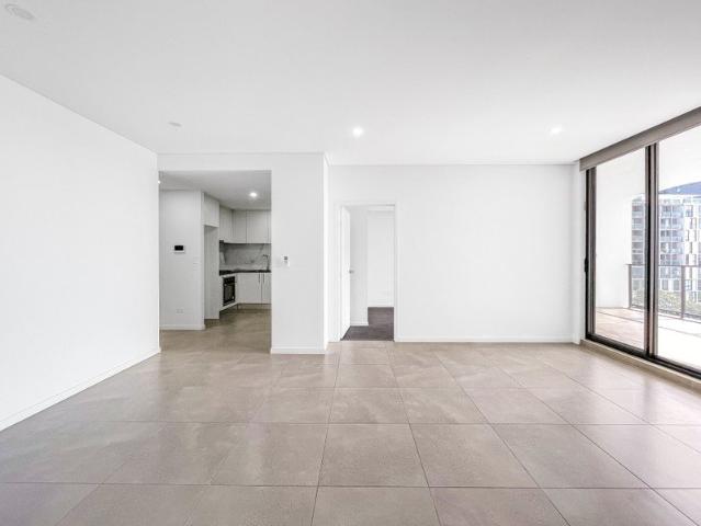 Stylish Two Bedroom Unit with Modern Kitchen, Ensuite, and Oversized Balcony in Prime Location
